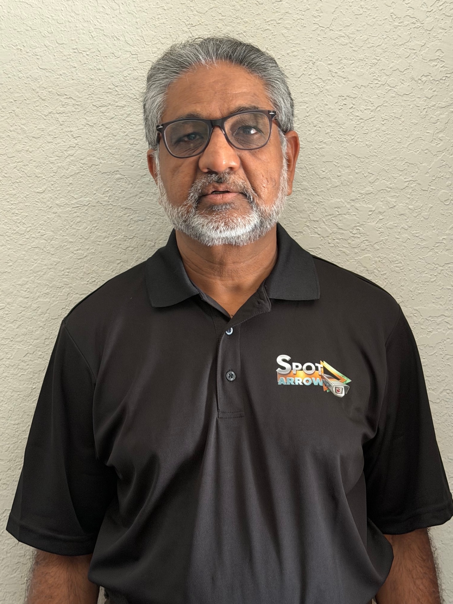 Portrait of Vasant Patel, President of Spot Arrow